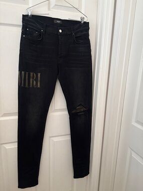 AMIRI Black Skinny Jeans with Logo Print